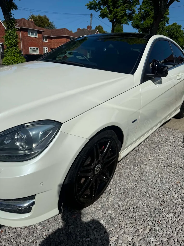 A customer's car sparkling at Marlow's Street Car Wash